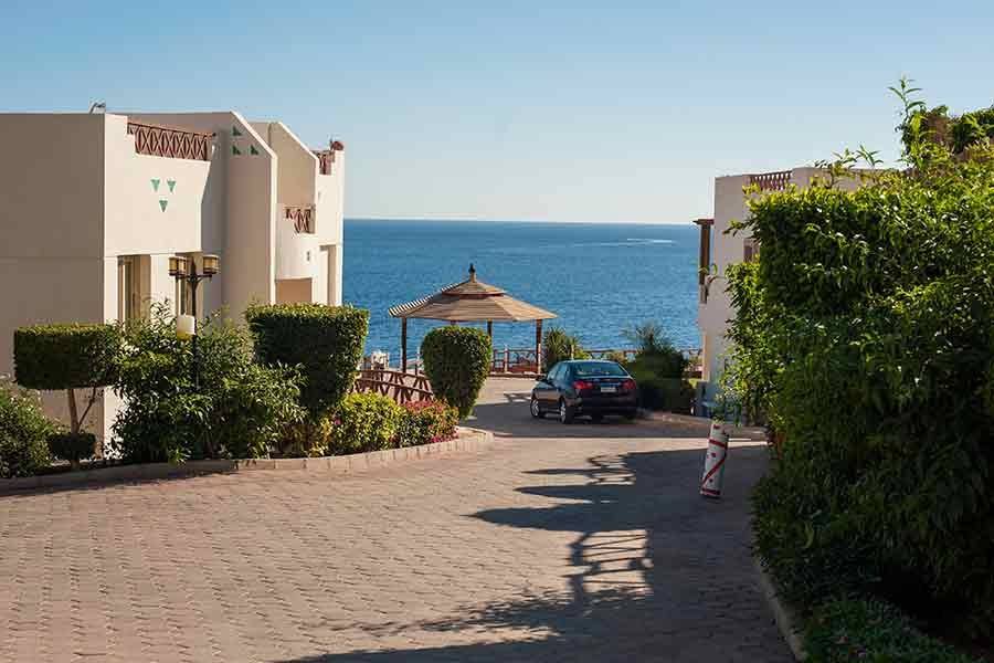 Paved walkway with a sea view at the end
